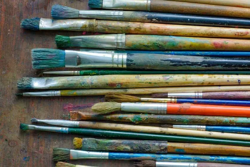 Heavily used oil paint brushes