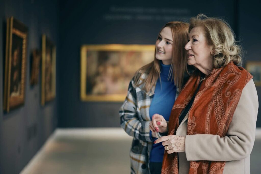 A mother and daughter viewing a art in museums