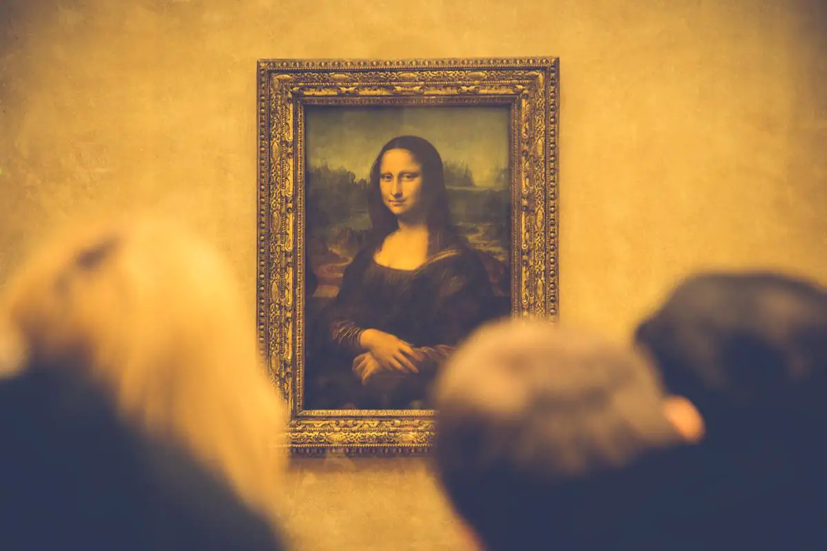 Image of the Mona Lisa, a portrait of a woman with a mysterious smile, painted by Leonardo da Vinci during the Renaissance period.